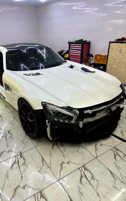 Mercedes-AMG GT, Before: Stock white, bumpers off for a full wrap